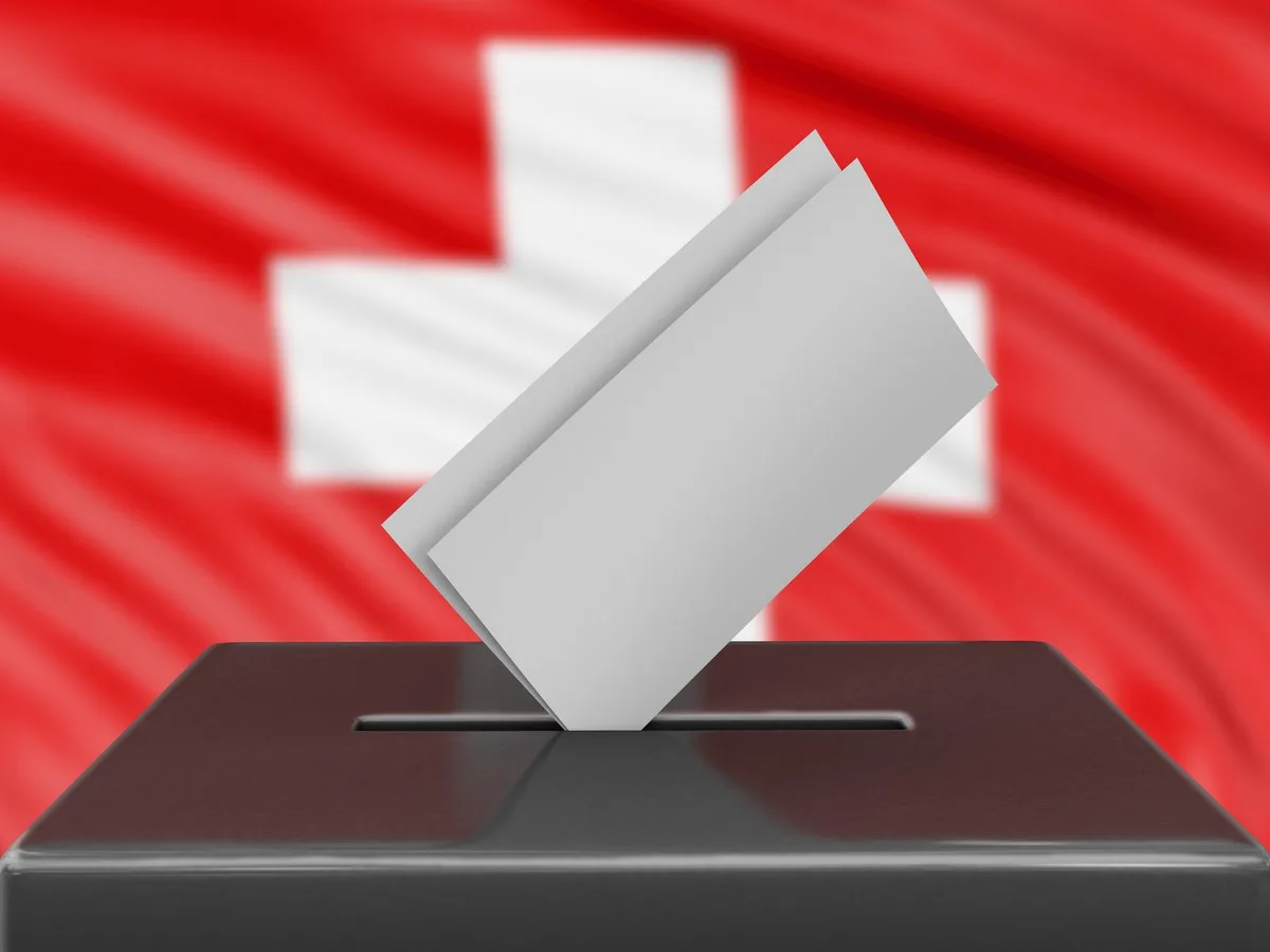 AdobeStock_324815002 Ballot box with Swiss flag on background