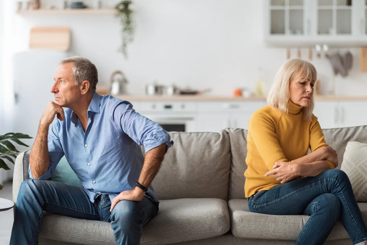AdobeStock_484908703 Unhappy Mature Spouses After Quarrel Sitting Back-To-Back At Home