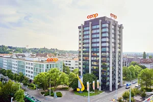 Der Coop Hauptsitz in Basel. Der Detailhändler kann auf ein erfolgreiches Jahr 2023 zurückblicken.