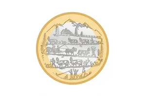 Die Münze zeigt einen Alpabzug in Form eines Scherenschnitts.