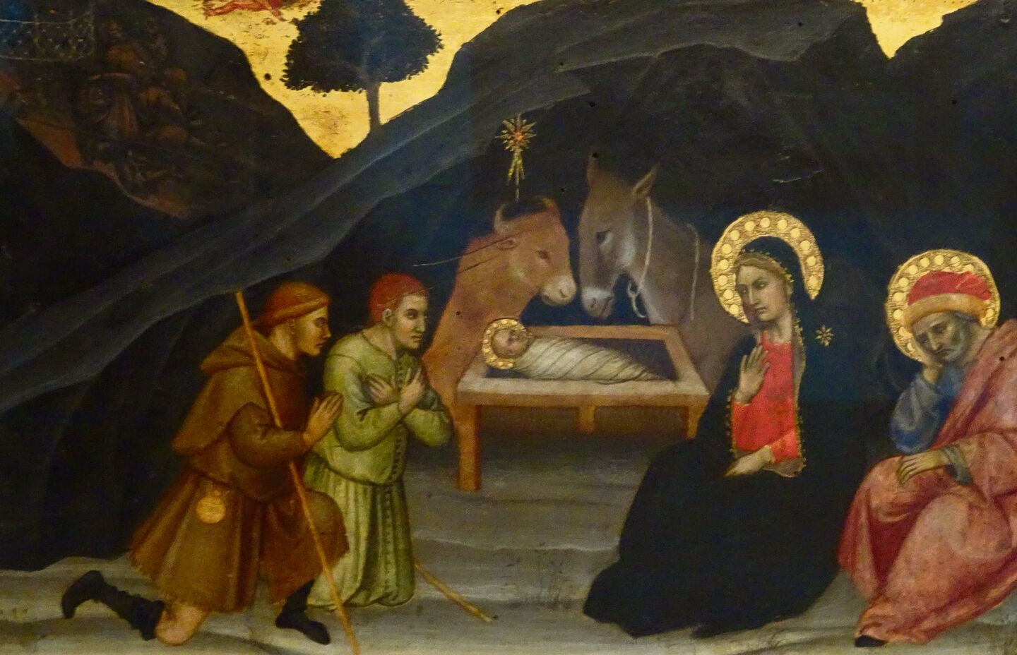 Krippenszene der Anbetung Jesu durch die Hirten an der Krippe mit Ochs und Esel, gemalt von Taddeo di Bartolo (1362–1422), Pinacoteca Nazionale, Siena, Italien.